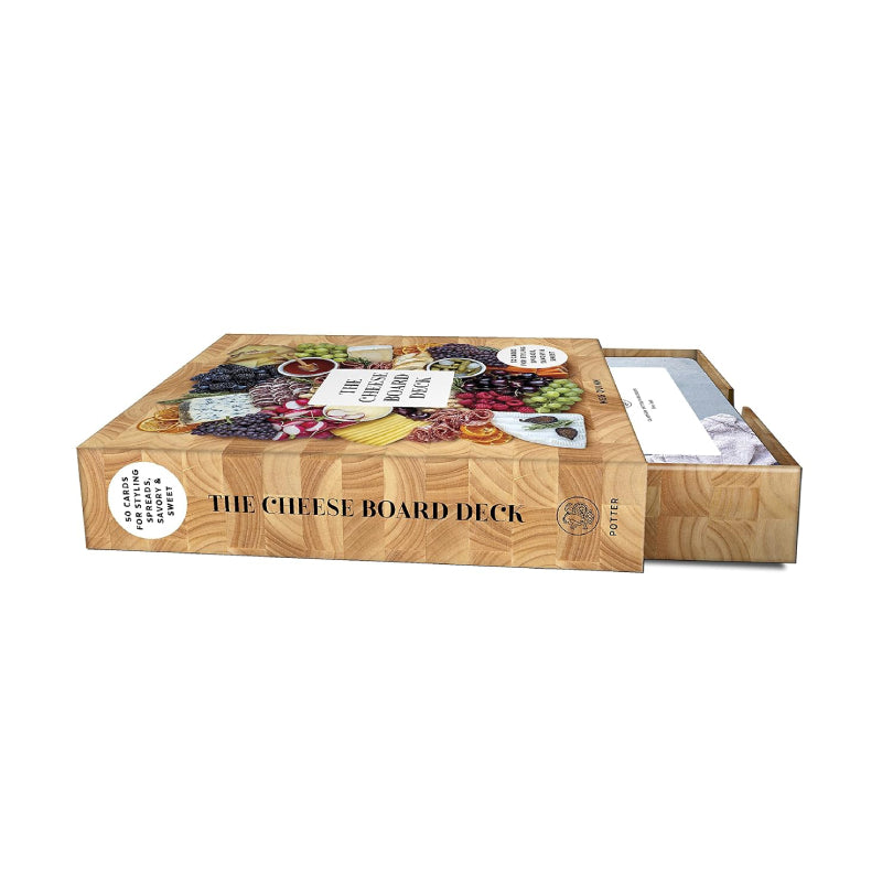 The Cheese Board Deck box with a sliding drawer partially open, showing the wooden exterior and colorful food-themed illustration on the front.