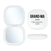 white LED Compact mirror with 'GRAND-MA' definition text on a white background