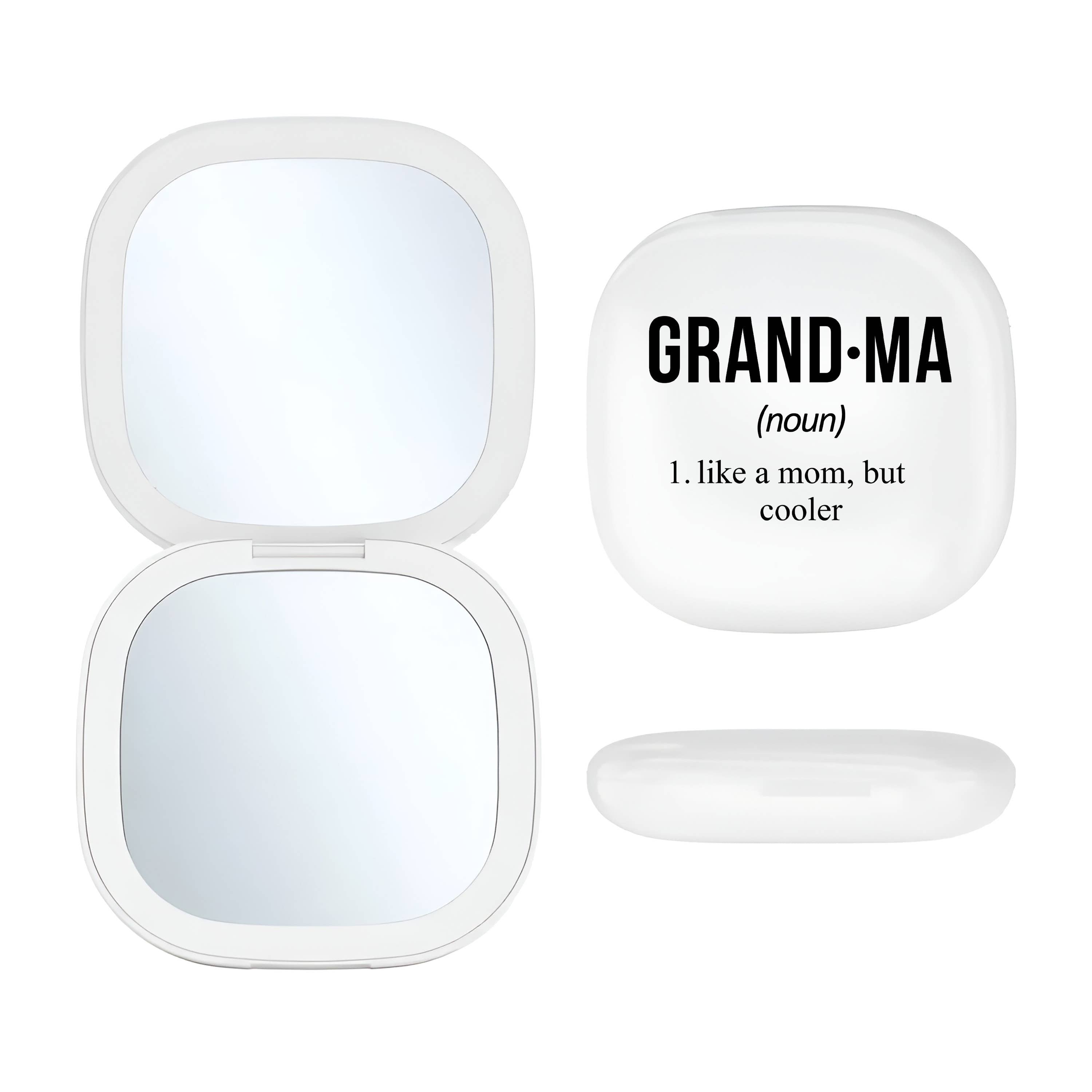 white LED Compact mirror with 'GRAND-MA' definition text on a white background